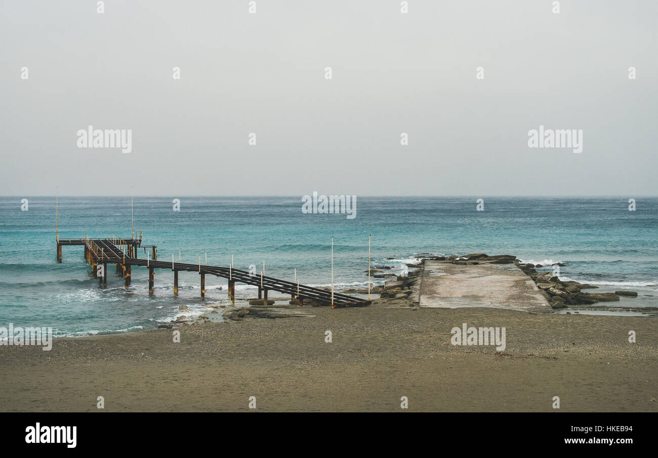 Empty sandy coast after storm in winter, Alanya, Turkey Stock Photo