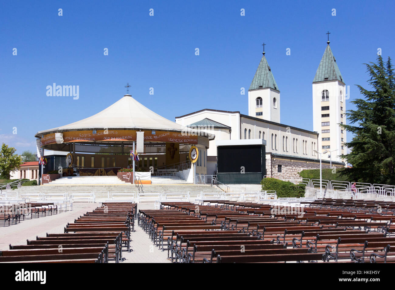 MEDJUGORJE, BOSNIA AND HERZEGOVINA, August 20 2016. The square behind the Saint James church on a sunny day. Stock Photo