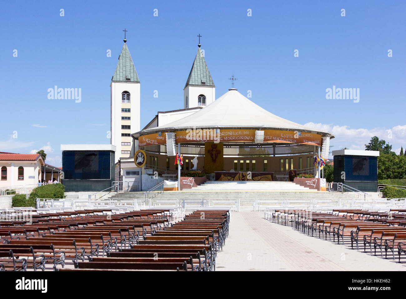 MEDJUGORJE, BOSNIA AND HERZEGOVINA, August 20 2016. The square behind the Saint James church on a sunny day. Stock Photo