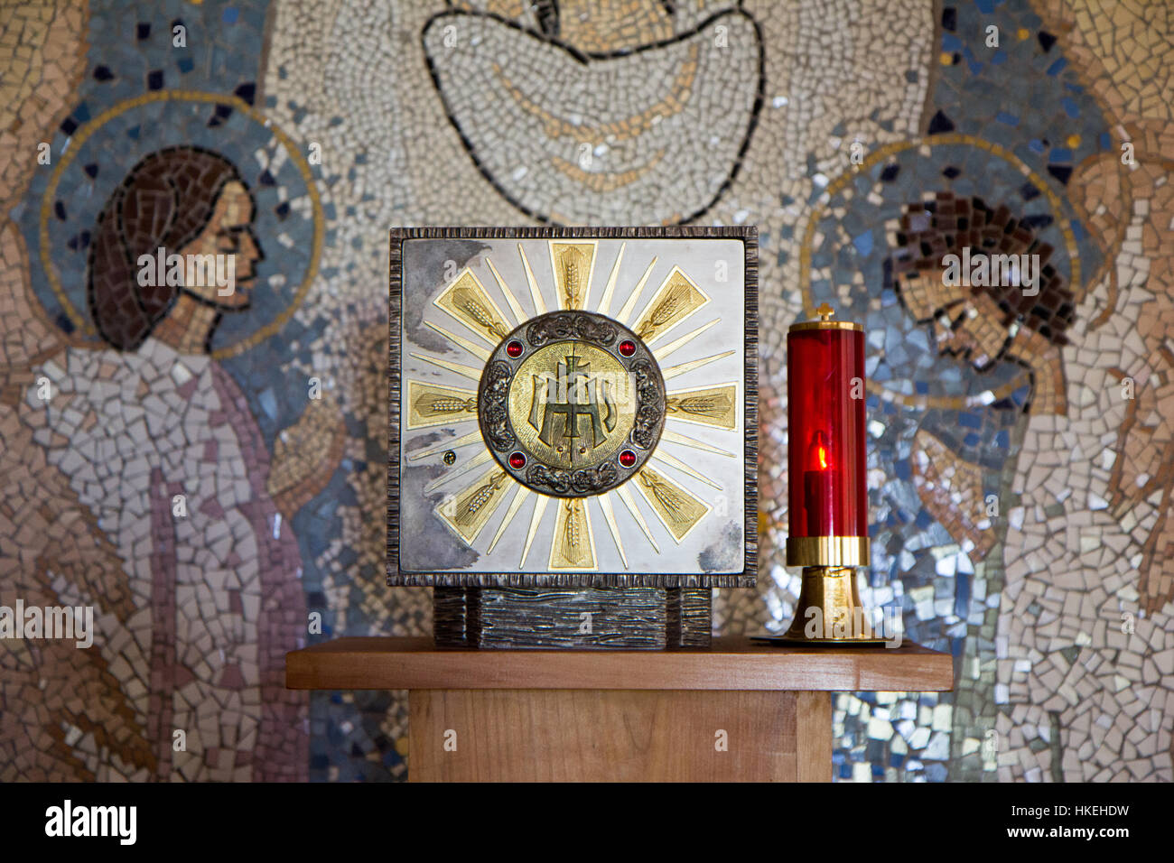 A tabernacle with the Eucharist and a sanctuary candle lamp in a chapel in Majčino selo [Mother's village] in Medjugorje, Bosnia and Herzegovina. Stock Photo