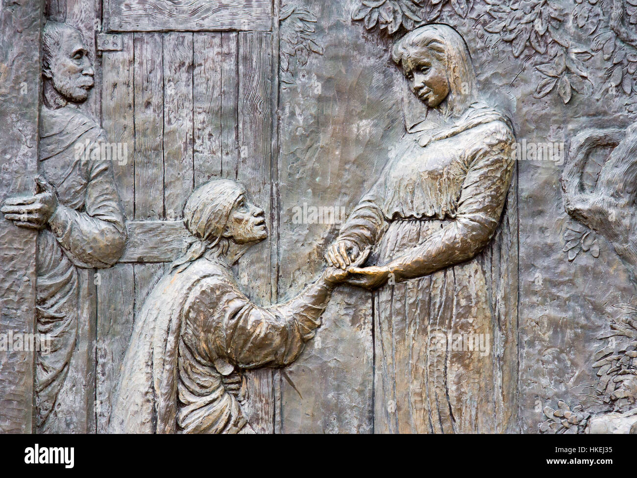 Bronze relief representing the visitation of Saint Elizabeth by Virgin Mary. Medjugorje, Bosnia and Herzegovina, 2016/11/12. Stock Photo