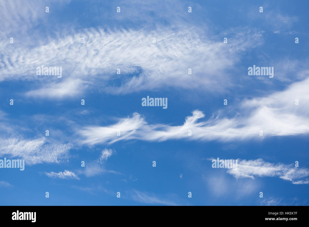 Wispy cirrus clouds blue sky Stock Photo - Alamy