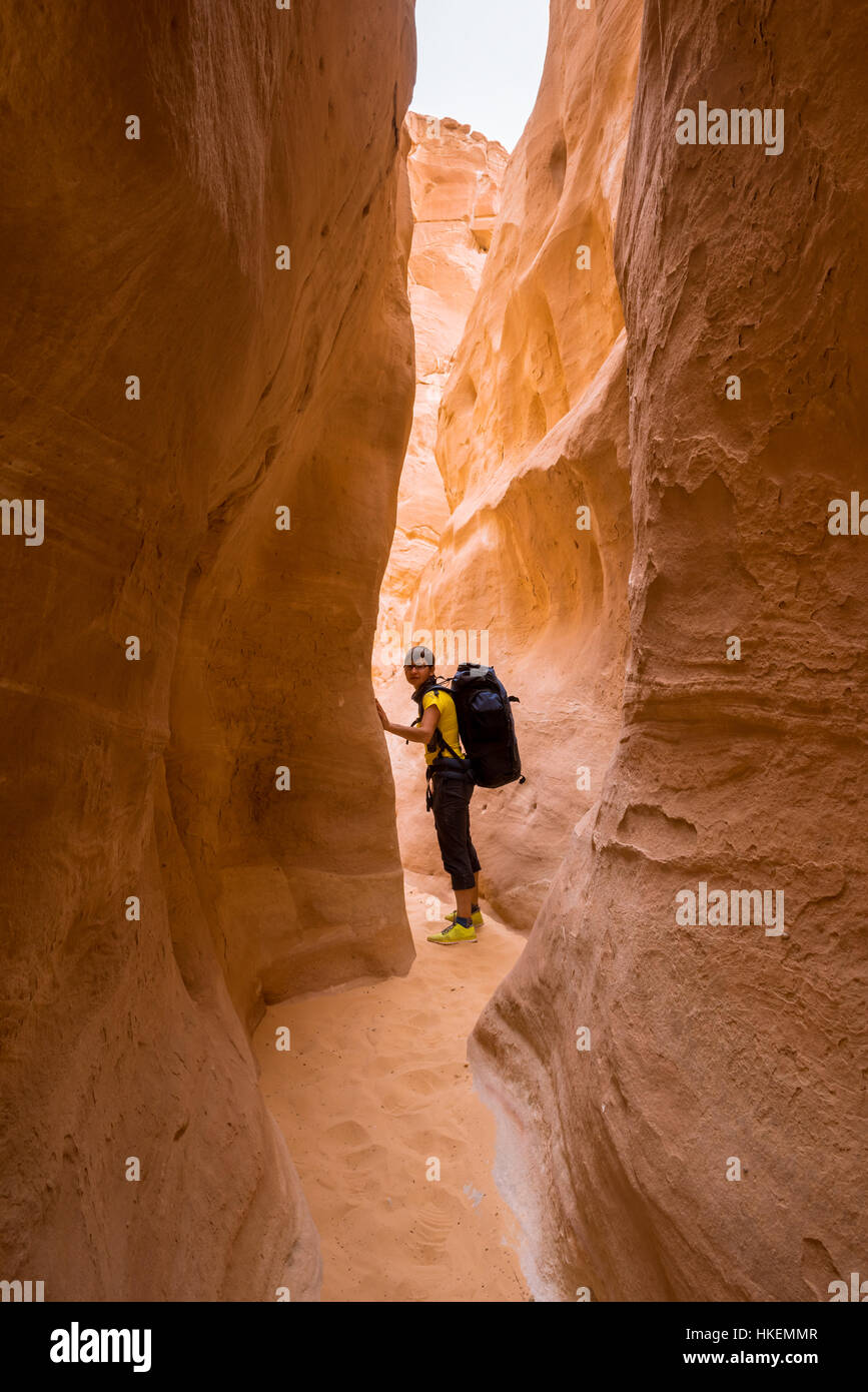 Woman mountain Hiker with backpack enjoy view in Sinai desert Stock Photo