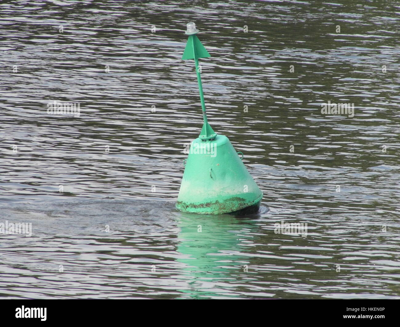 Green buoy on the River Thames at Putney Stock Photo Alamy