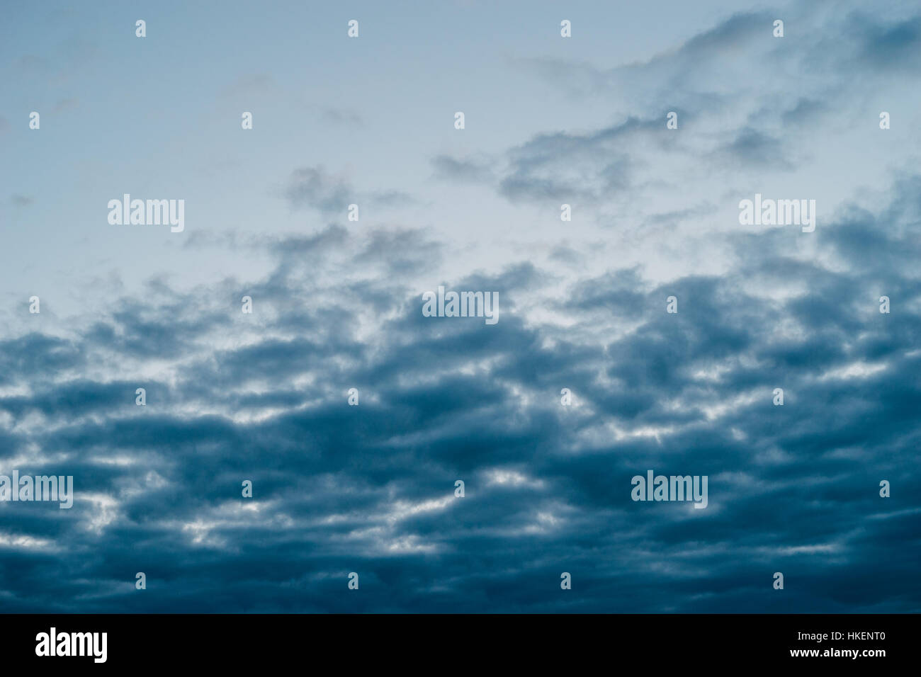 Dark stormy clouds covering sky by evening Stock Photo - Alamy