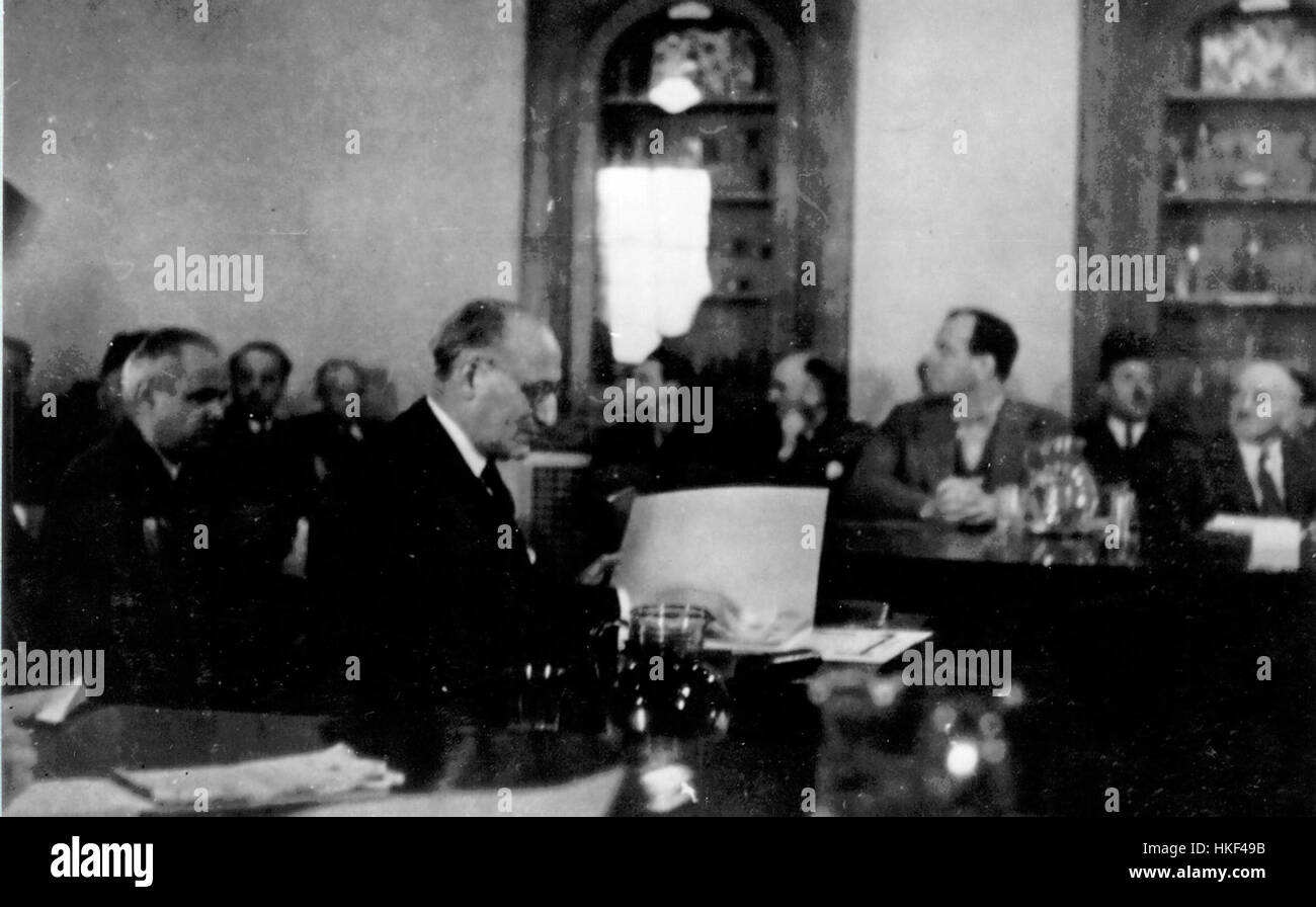 Eliezer Siegfried Hoofien is depicted at the Anglo American Committee, an influential figure in the post-World War II period. The image captures his role in key diplomatic and political discussions aimed at shaping post-war policies. Stock Photo