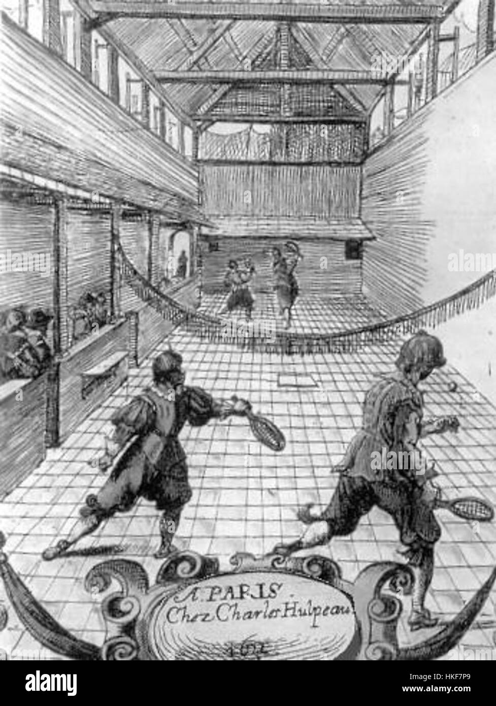 The artwork titled 'Jeu de paume' captures a historical scene of the popular 16th-century French game, often considered a precursor to tennis. The piece illustrates participants in traditional attire, playing on an indoor court, surrounded by the architecture of the time. Stock Photo
