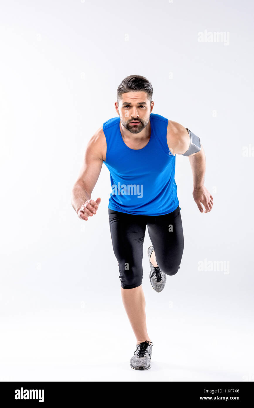 Athletic man running Stock Photo