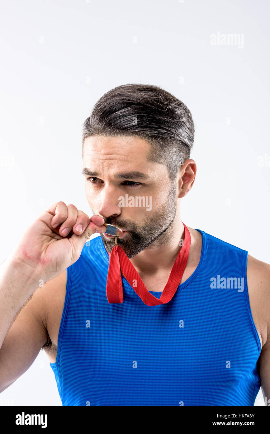Man with gold medal award Stock Photo