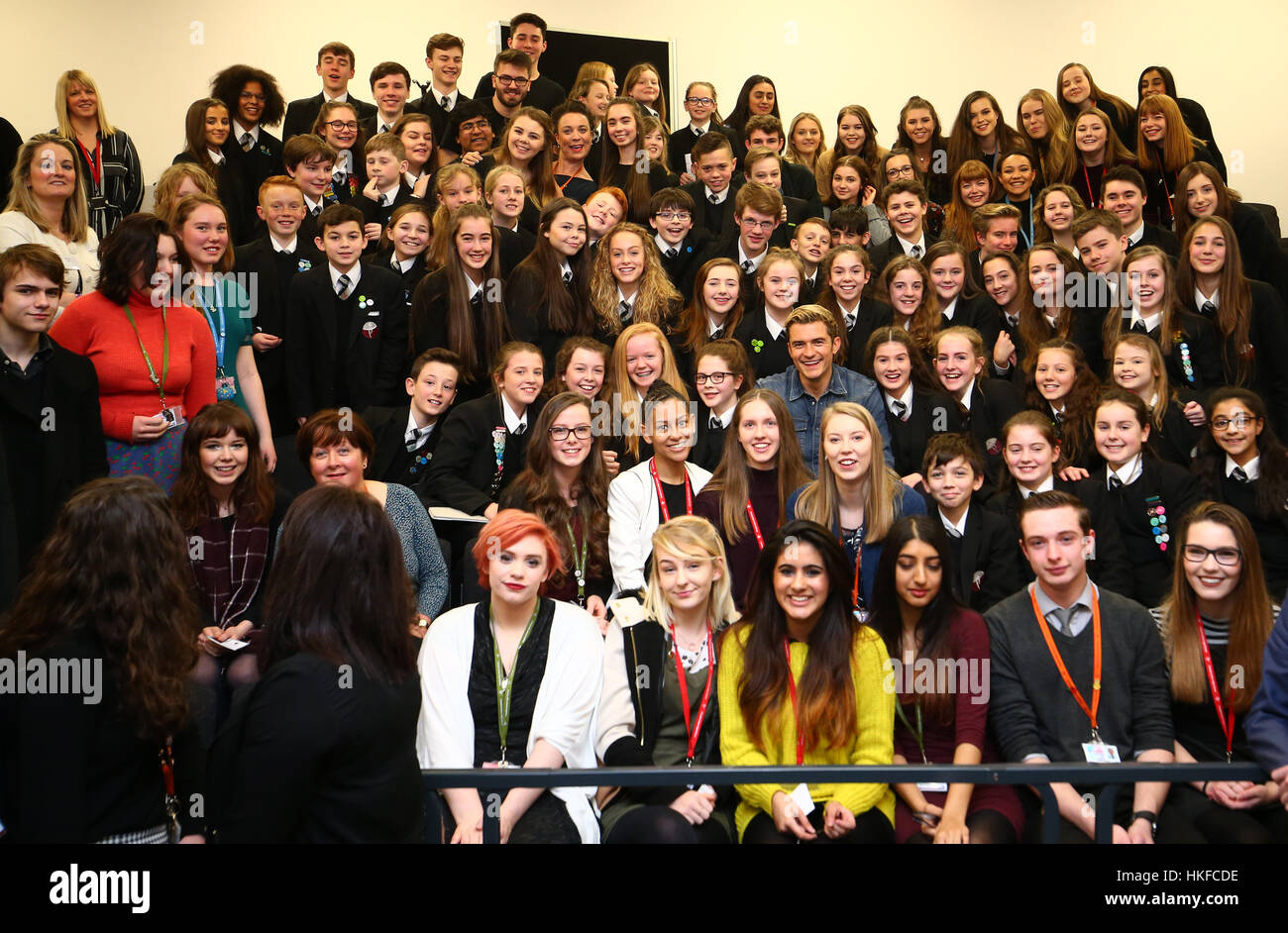 Actor Orlando Bloom meets pupils whilst attending the Laurus Trust launch held at Cheadle Hulme High School, Cheadle Hulme, Cheadle. The Trust has co-created its own Curriculum with Patsy Rodenburg, and two of her former pupils - Orlando Bloom and Paapa Essiedu - who are helping run workshops along with the Royal Shakespeare Company - showcasing the ethos and type of work that will be embedded in Laurus Trust schools. Stock Photo