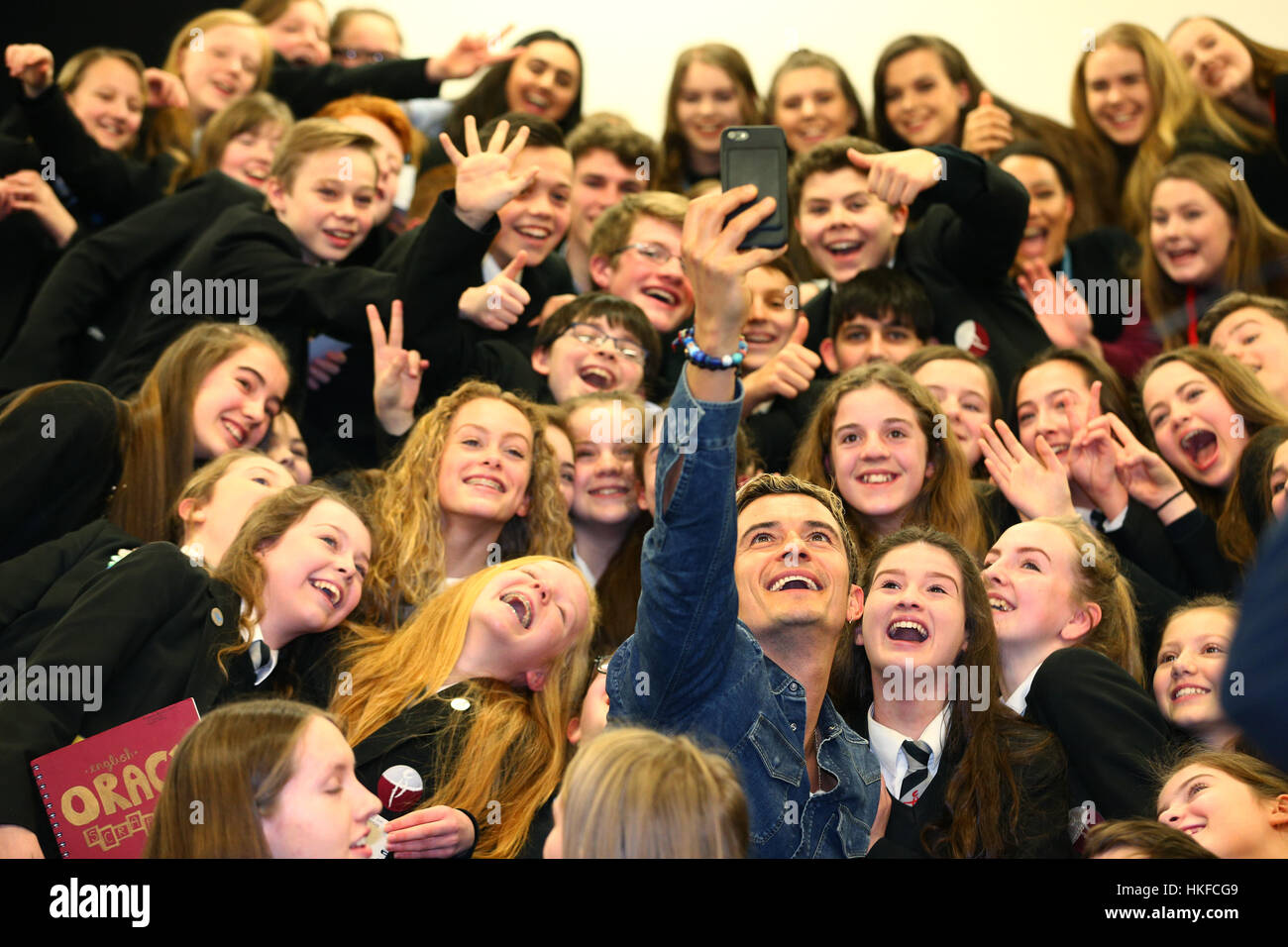 Actor Orlando Bloom meets pupils whilst attending the Laurus Trust launch held at Cheadle Hulme High School, Cheadle Hulme, Cheadle. The Trust has co-created its own Curriculum with Patsy Rodenburg, and two of her former pupils - Orlando Bloom and Paapa Essiedu - who are helping run workshops along with the Royal Shakespeare Company - showcasing the ethos and type of work that will be embedded in Laurus Trust schools. Stock Photo
