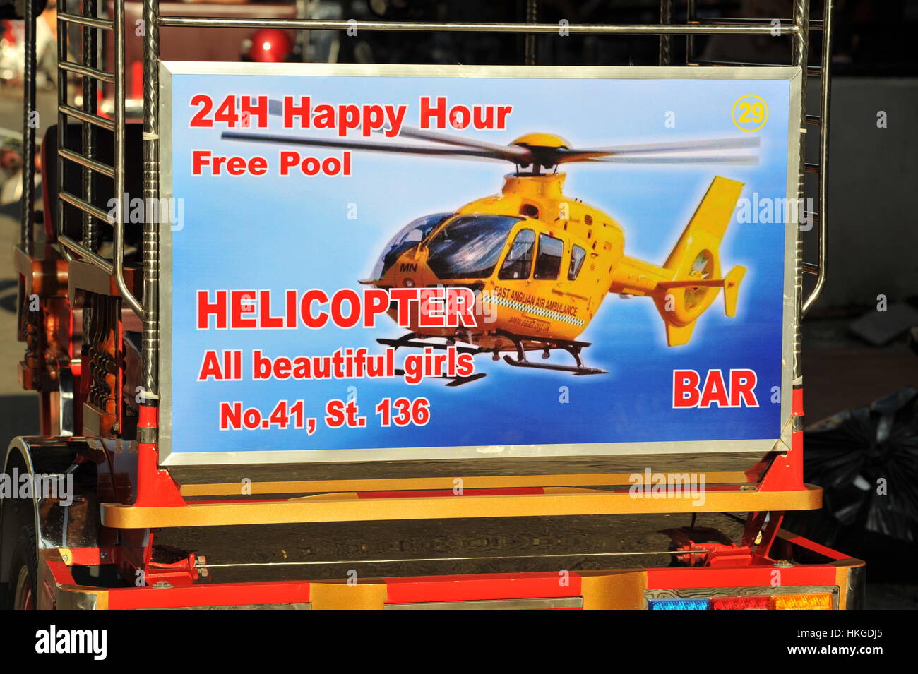 Sign Advertising Helicopter Girly Bar On The Back Of A Tuk