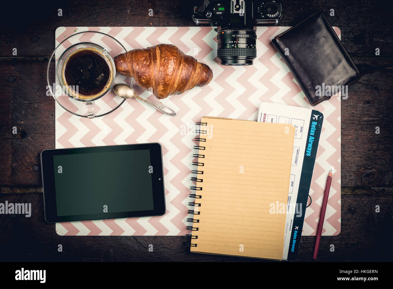 Journey staff on the desktop: notepad, tikets, wallet, coffee and camera Stock Photo