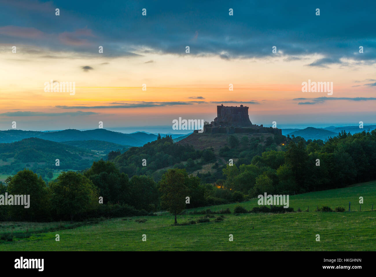 Murol (central France): the Castle of Murol at sunrise. Stock Photo