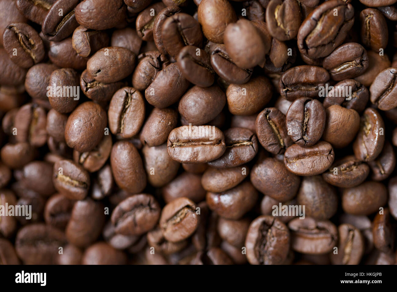 roasted coffee beans in abundance. caffeine, coffee seed, food, beans. Stock Photo