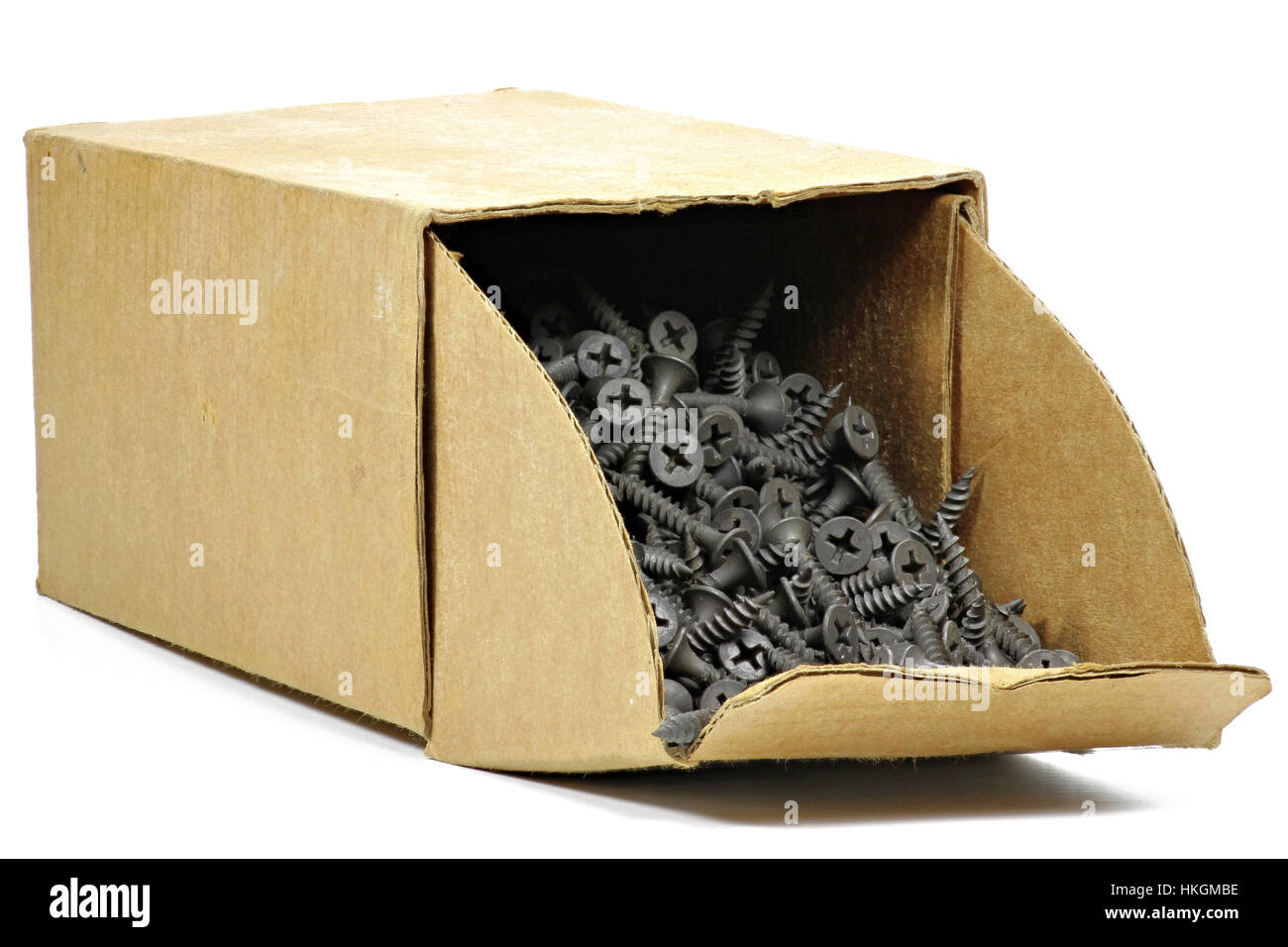 phosphated drywall screws in a cardboard container isolated on white background Stock Photo