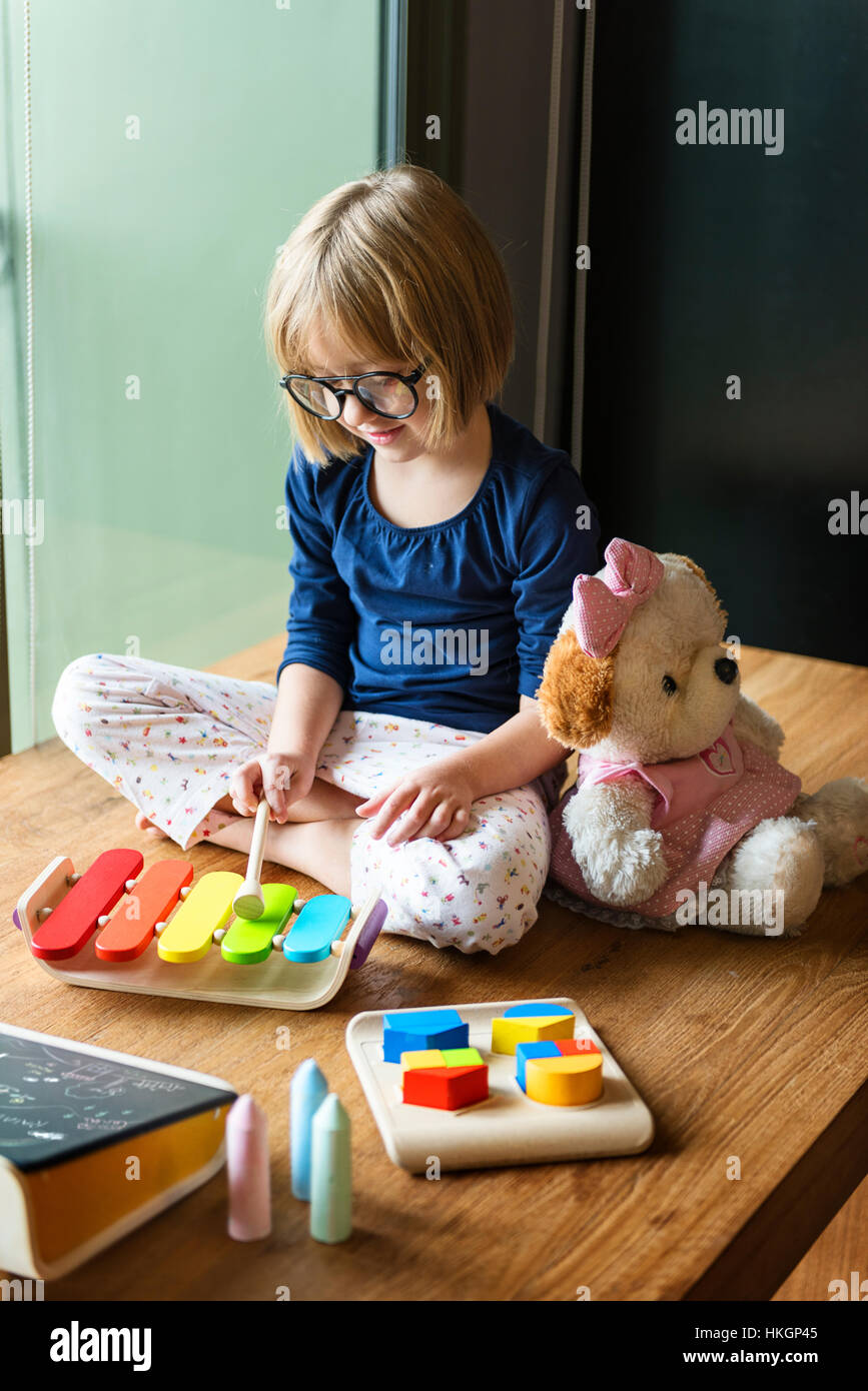 Little Girl Playing Toys Concept Stock Photo - Alamy