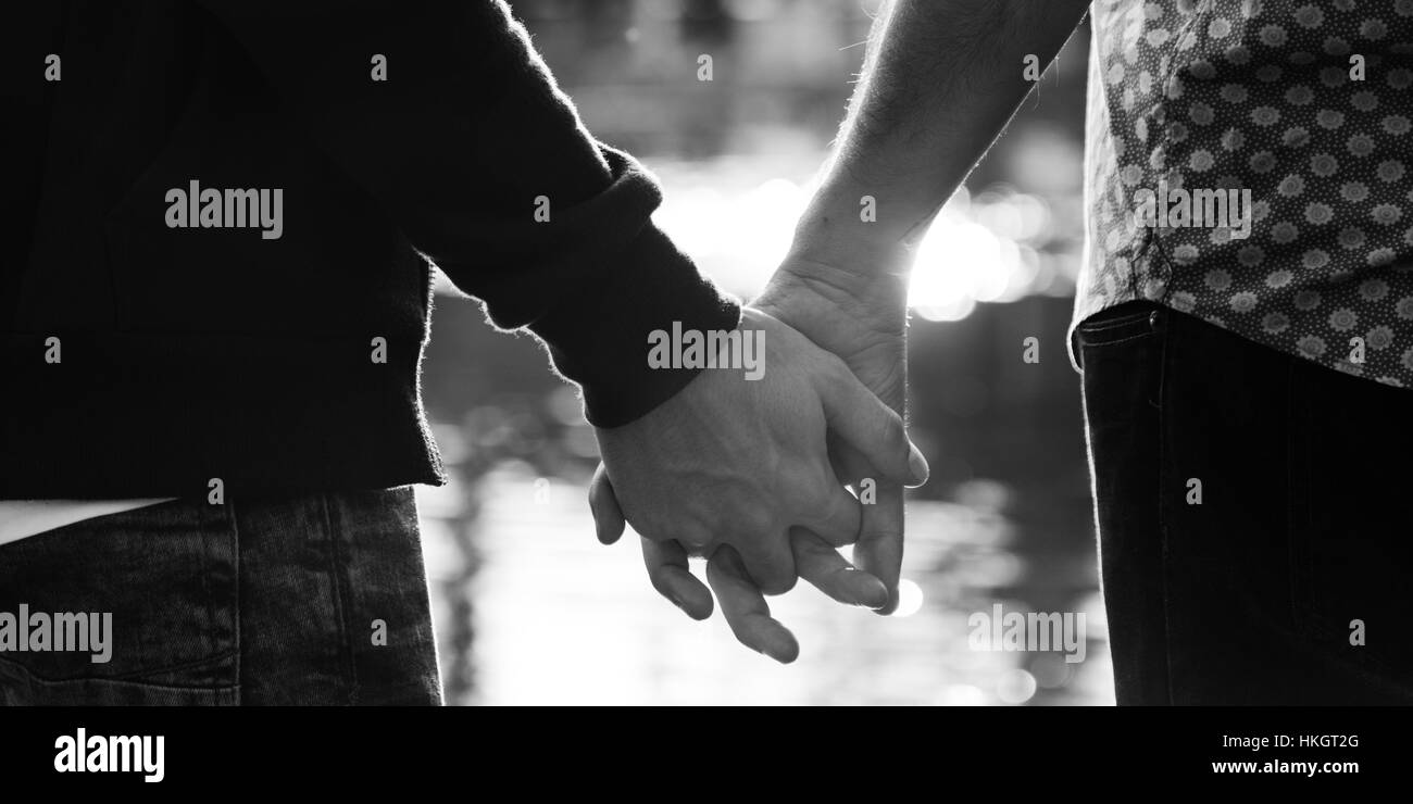 Gay couple holding hands Black and White Stock Photos & Images - Alamy