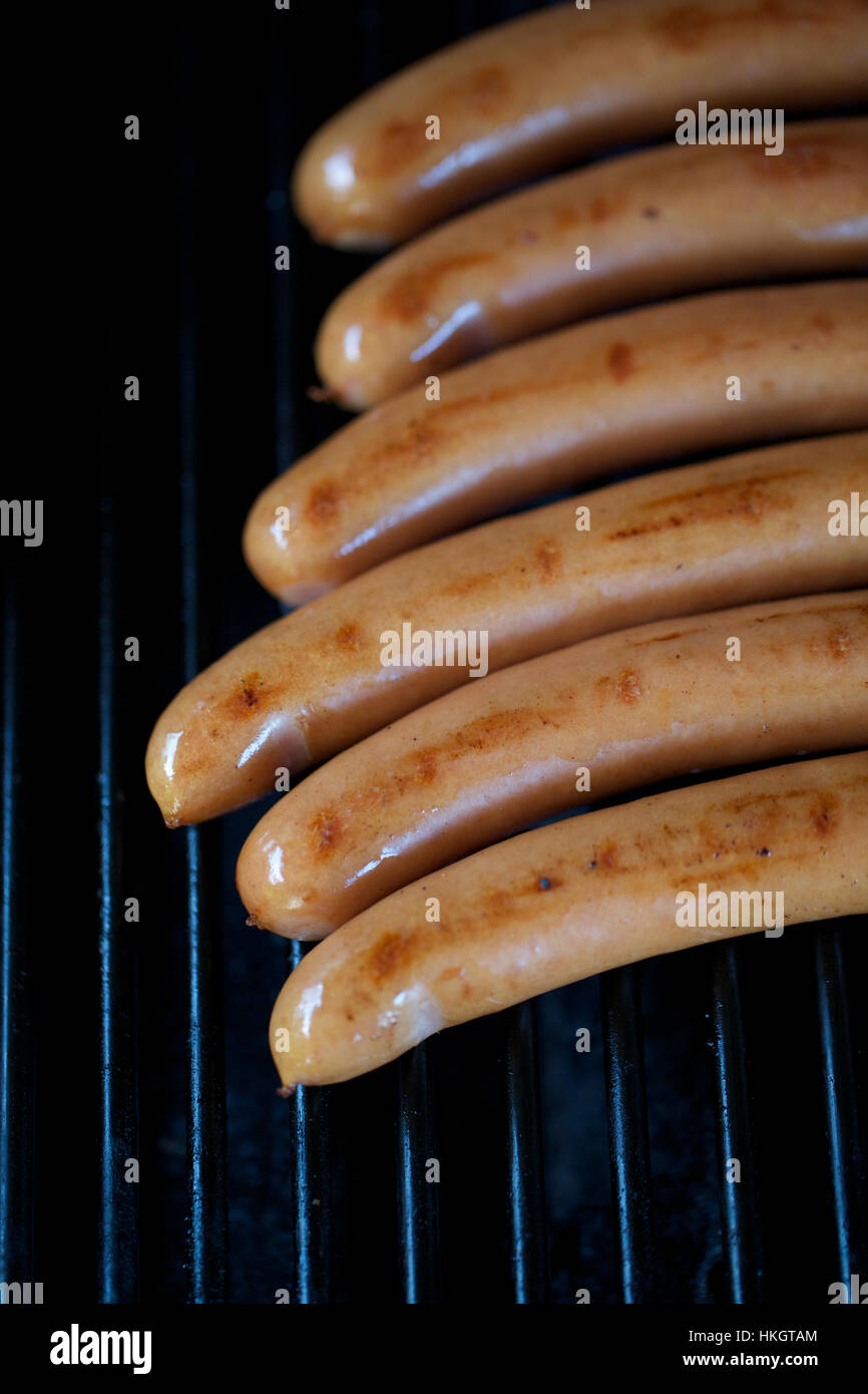 baked sausages on barbecue. grill, greasy, meat, food Stock Photo Alamy