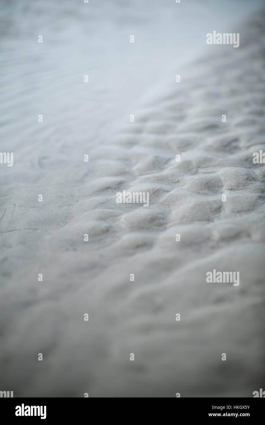sand at beach. rippled, wet sand, pattern, nature. Stock Photo
