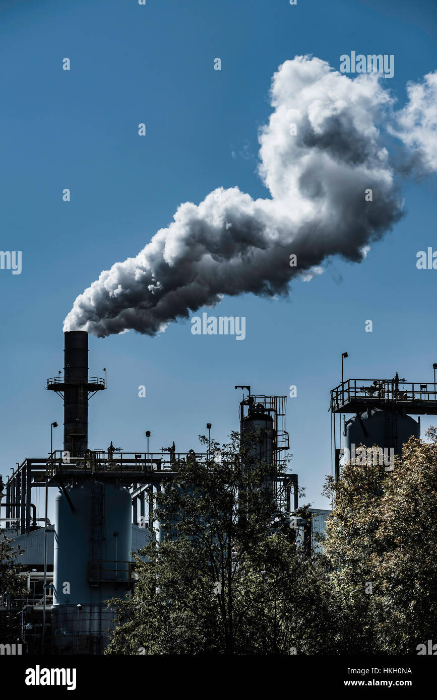 Industrial smoke stacks Stock Photo - Alamy