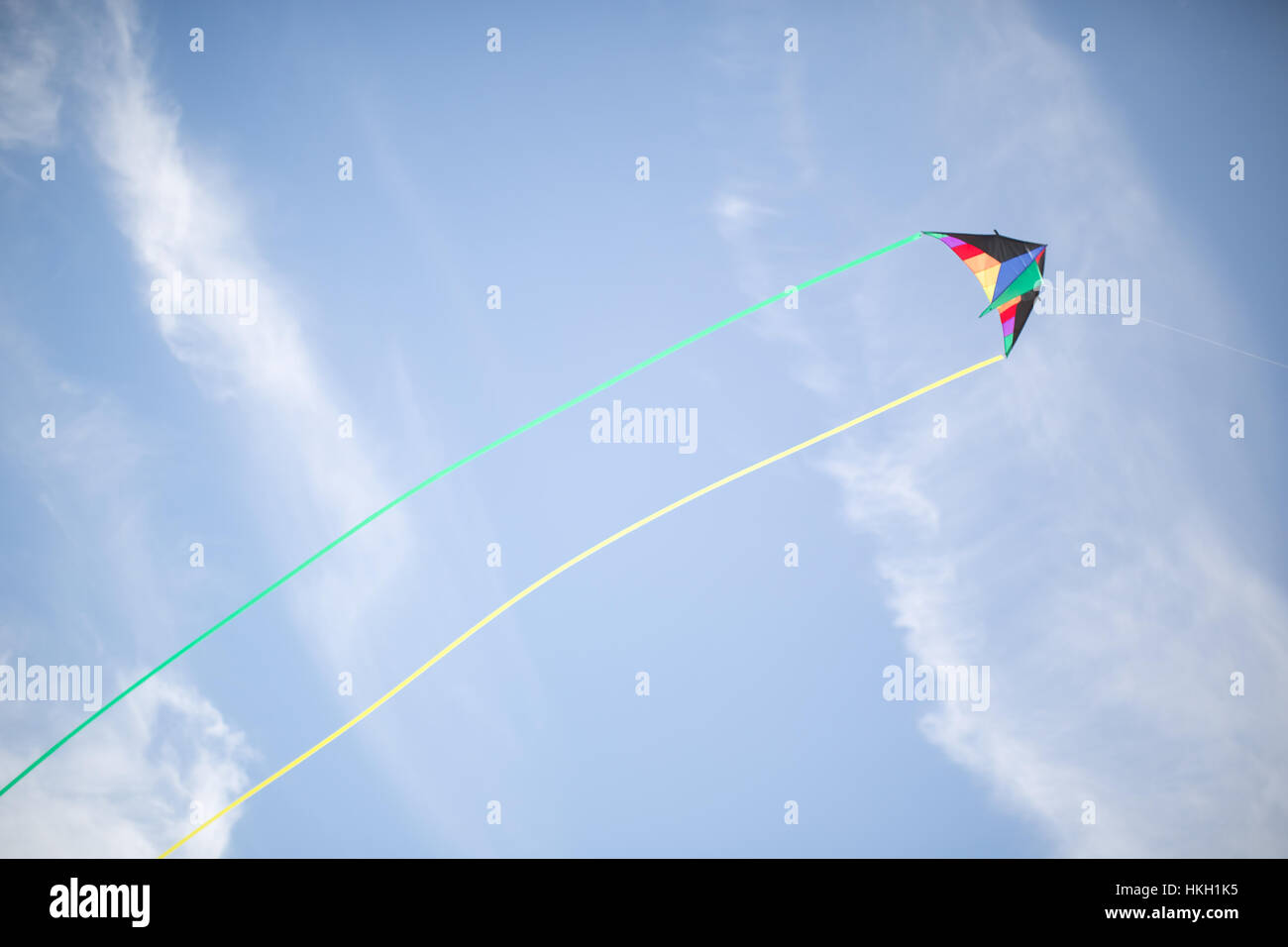 kite flying in sky. tail, cloud, motion, design Stock Photo Alamy