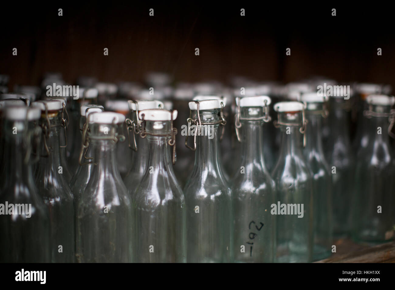 sealed glass bottles for sale at flea market. airtight, stopper