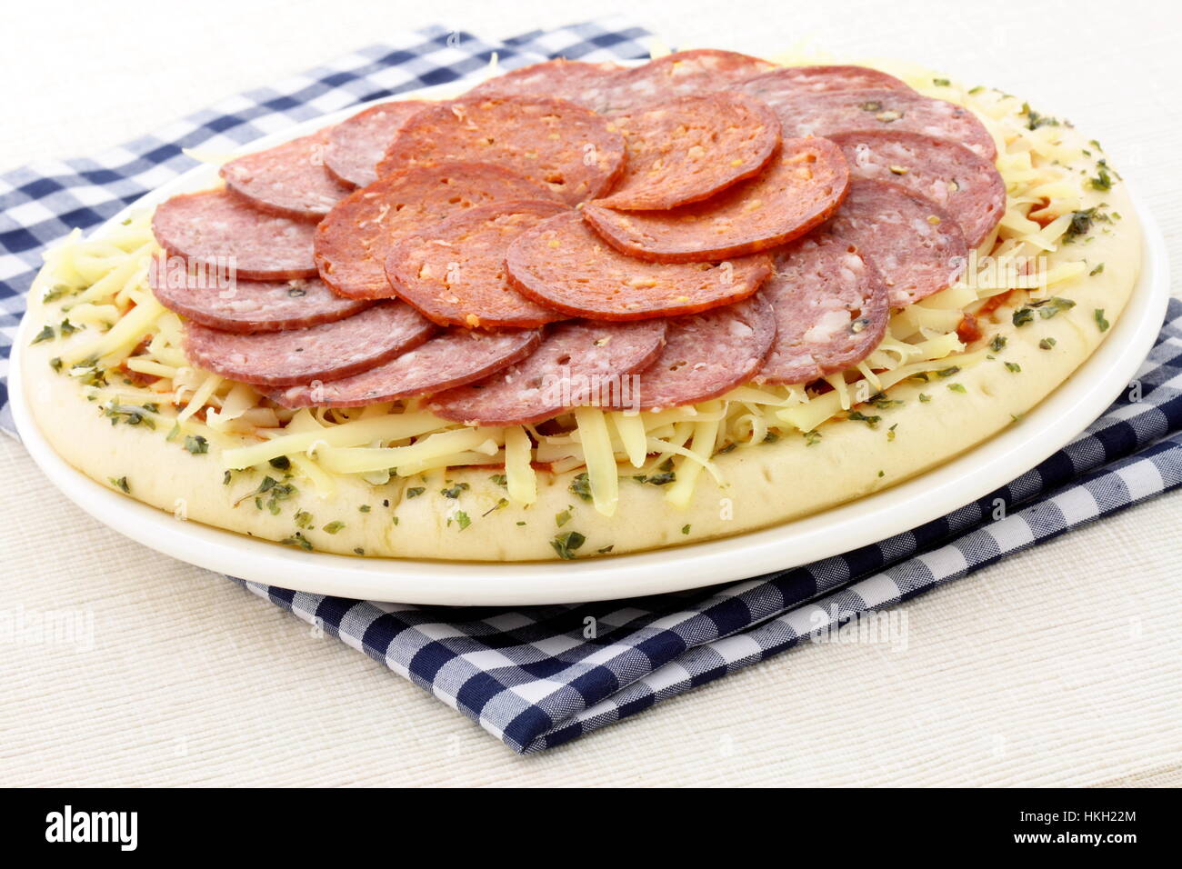 ready to bake delicious rustic salami and pepperoni cheese pizza Stock ...