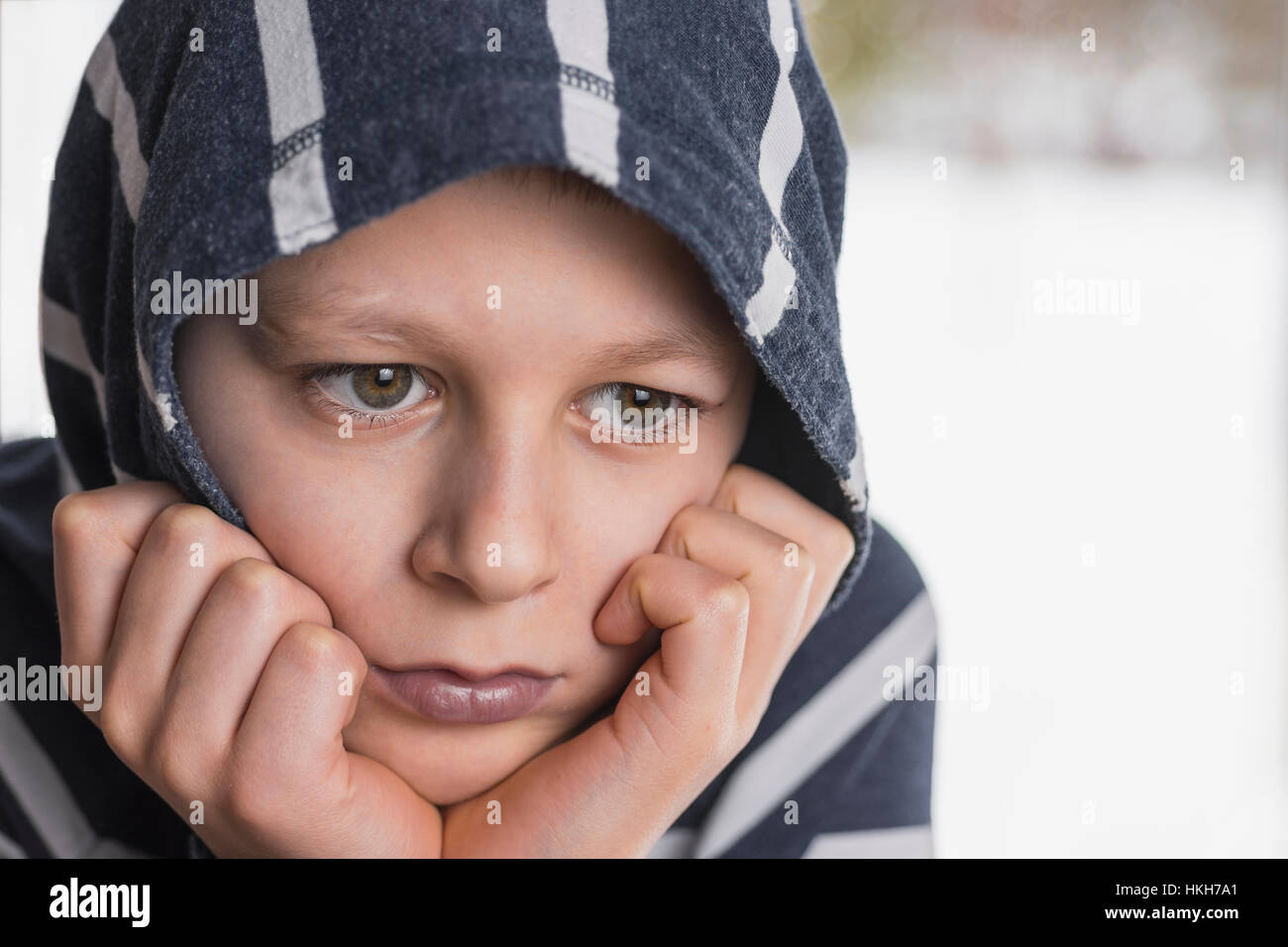 Sad Boy. Teenager with Sad Expression Face Close Up. Depression, Loneliness and Stress Concept. Stock Photo