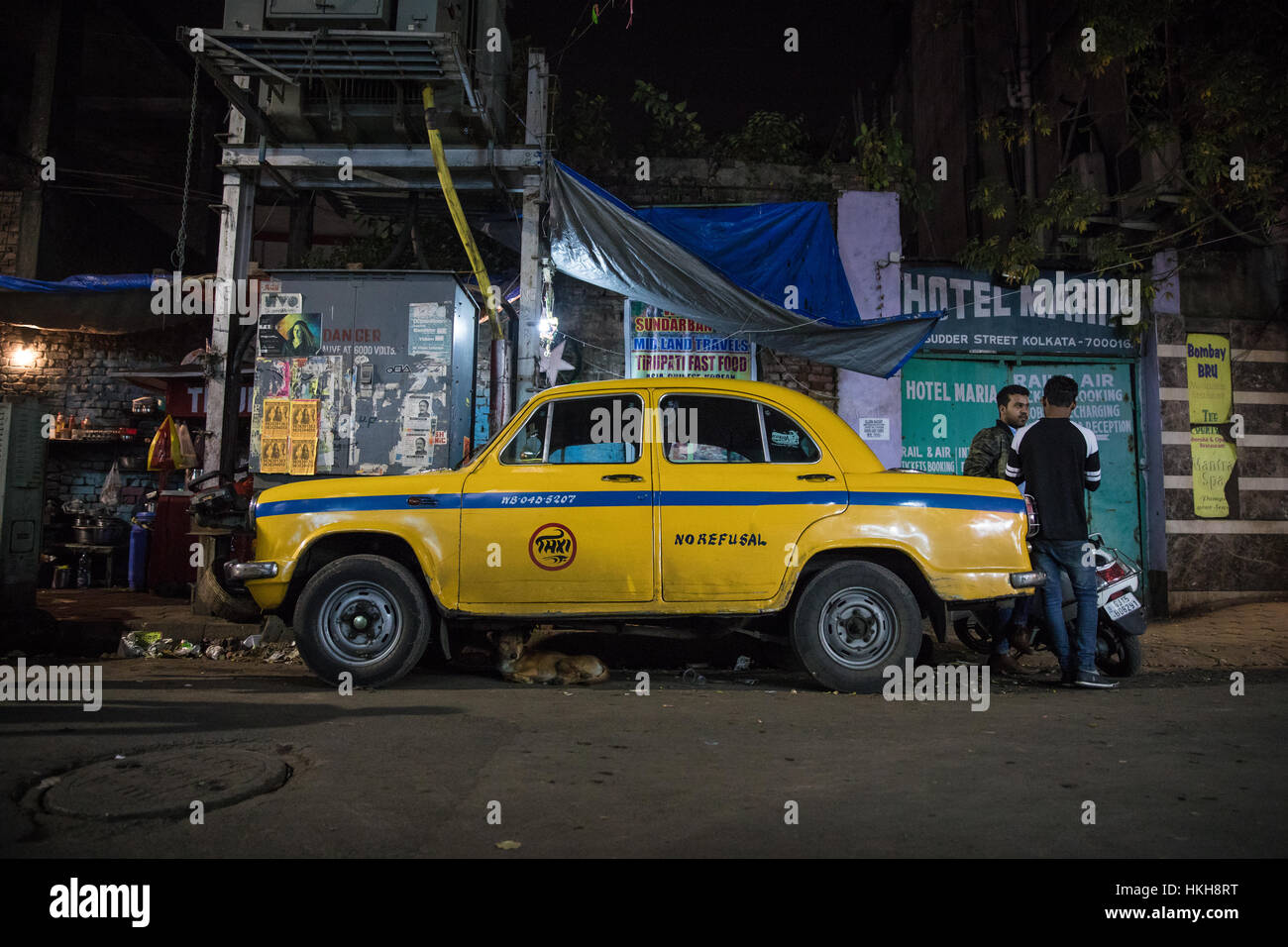 An iconic yellow Hindustan Ambassador taxi on Sudder Street in Kolkata (Calcutta), West Bengal, India. Stock Photo