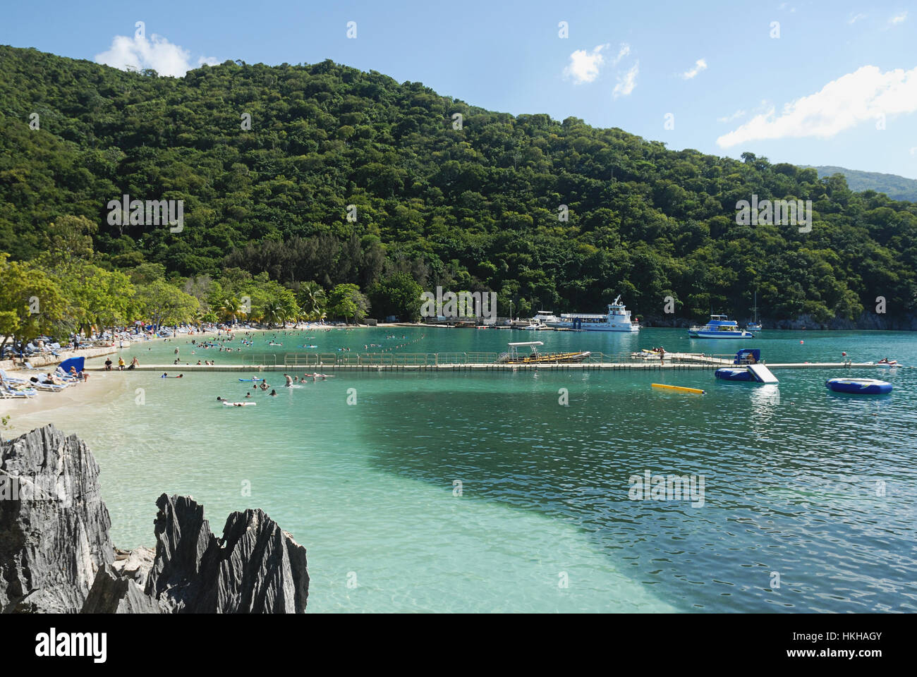 People enjoying day on beach in Haiti Stock Photo