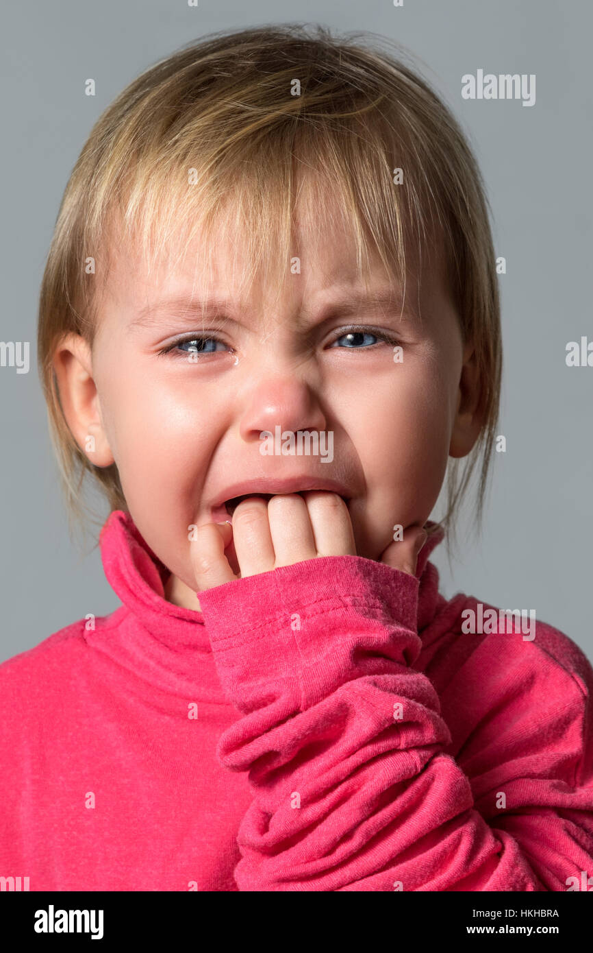 Crying baby girl isolated Stock Photo