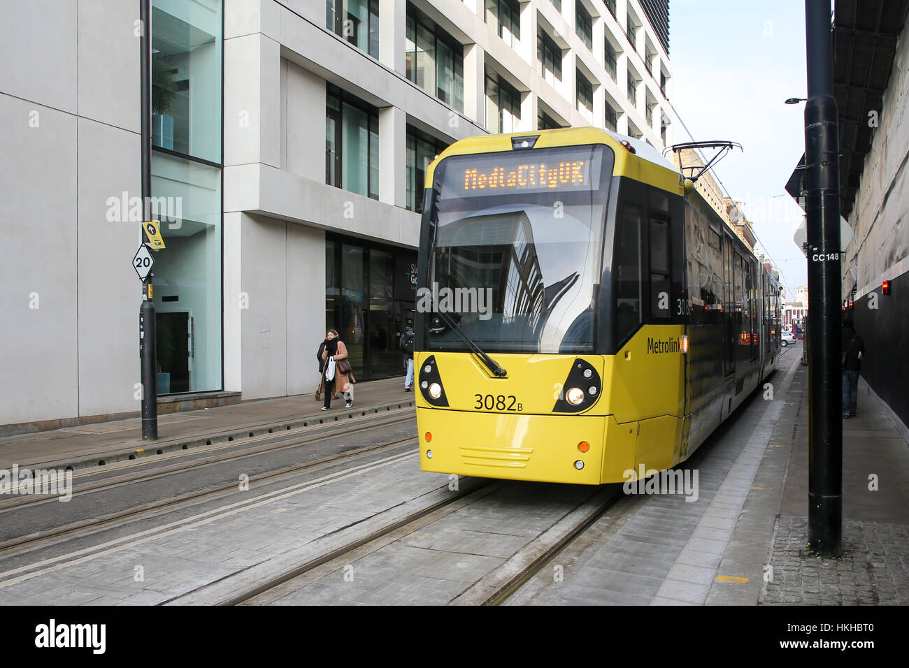 Metrolink Tram Passing Through Manchester Street Stock Photo - Alamy