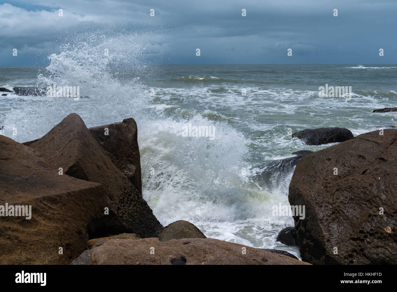 Atlantic waves crashing onto the rocks on Ilha do Mel, Paraná, Brazil, South America Stock Photo