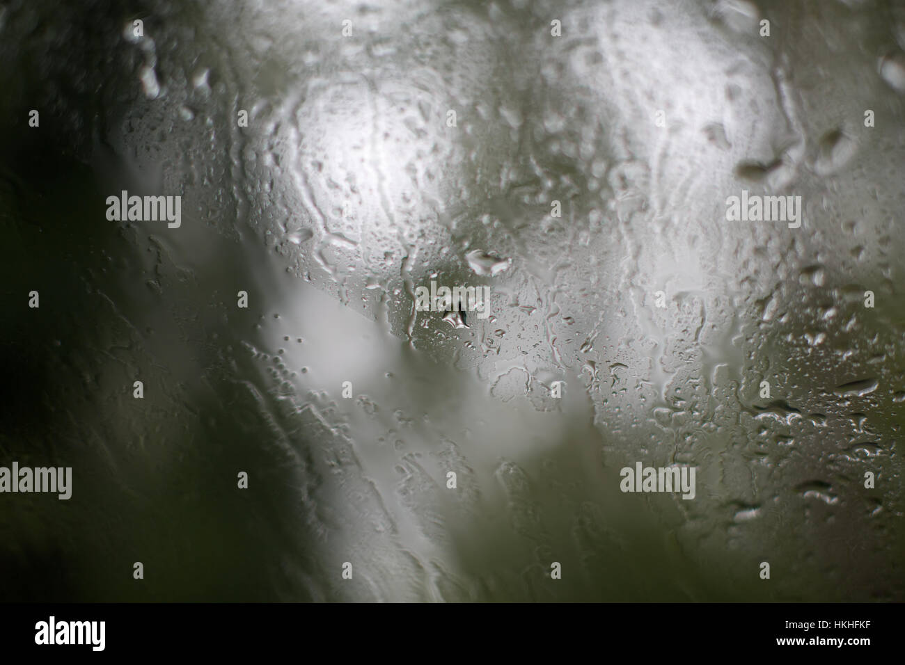 water drops on glass window. condensation, rainfall, weather, moisture. Stock Photo