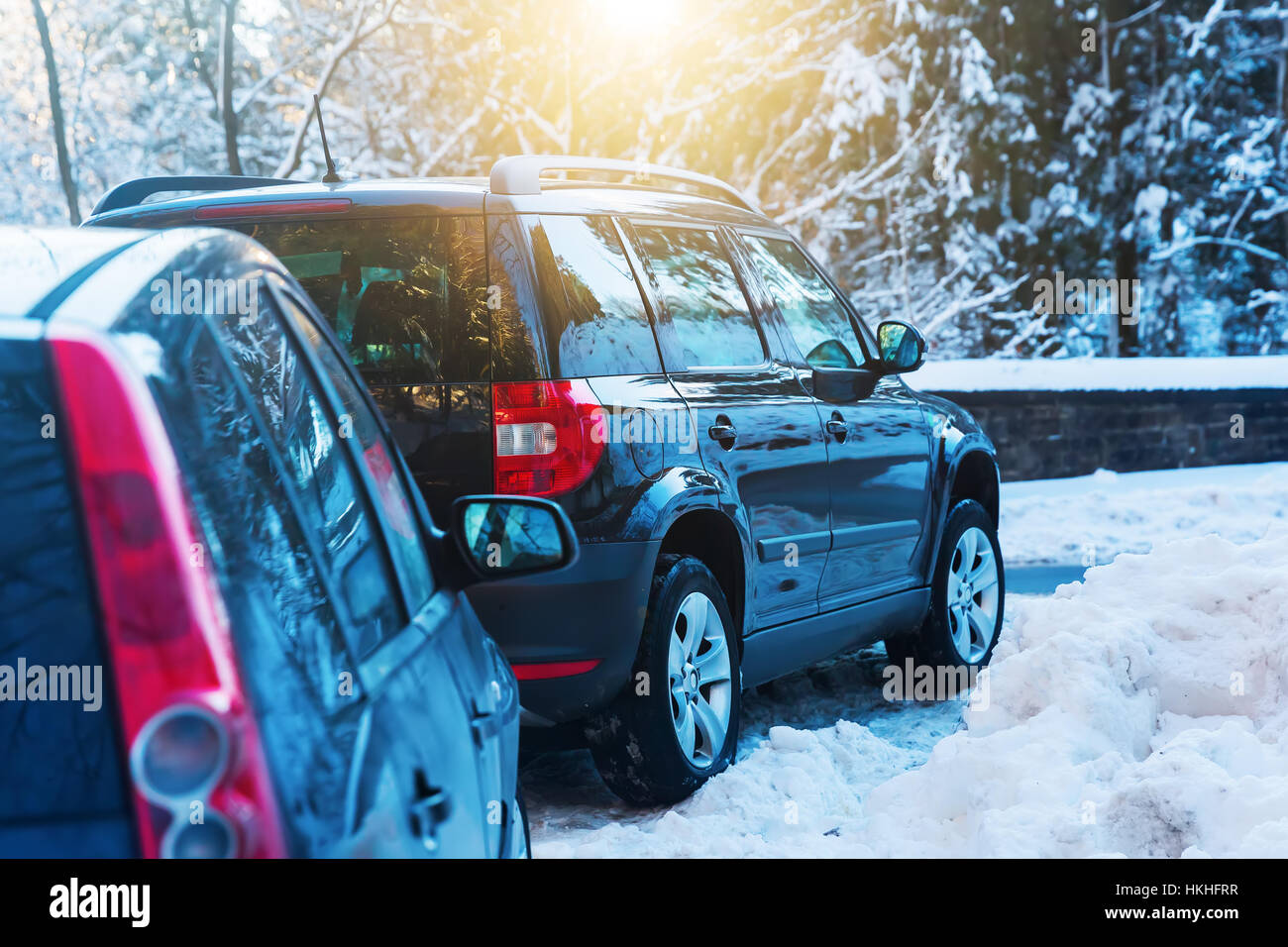 picture of parked cars at a road in winter Stock Photo - Alamy