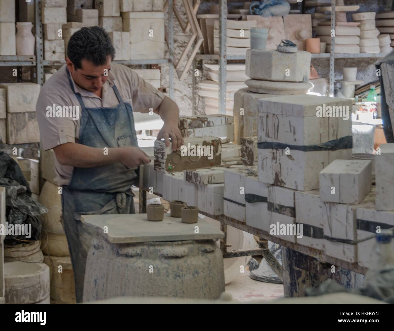 Mexico Pottery Production Hi Res Stock Photography And Images Alamy   A Mexican Artisan Separates Cups From Their Mold HKHGYN 