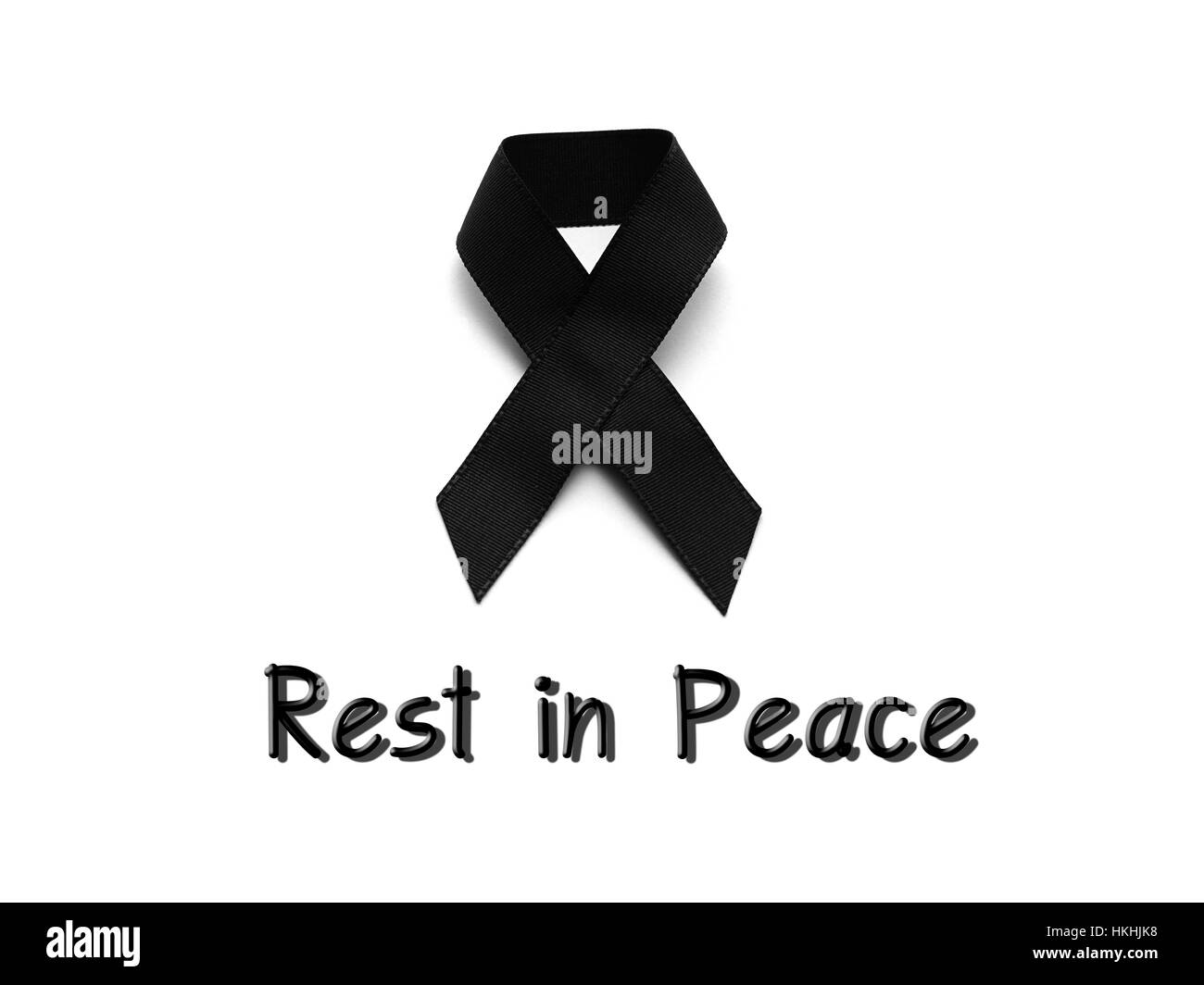 Black ribbon for mourning with rest in peace text on white background Stock Photo