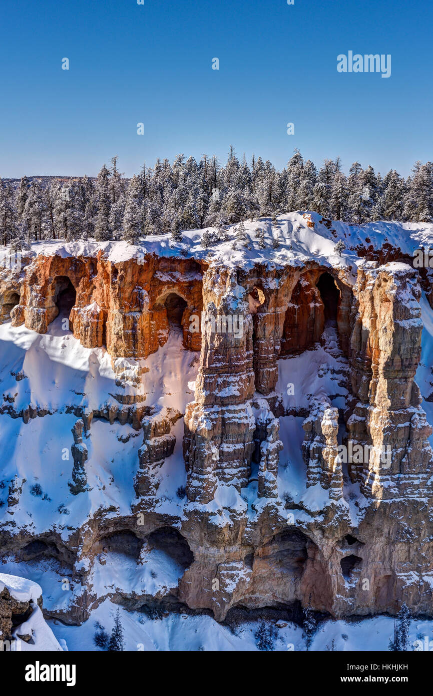 Holes in the canyon wall in Bryce canyon Stock Photo