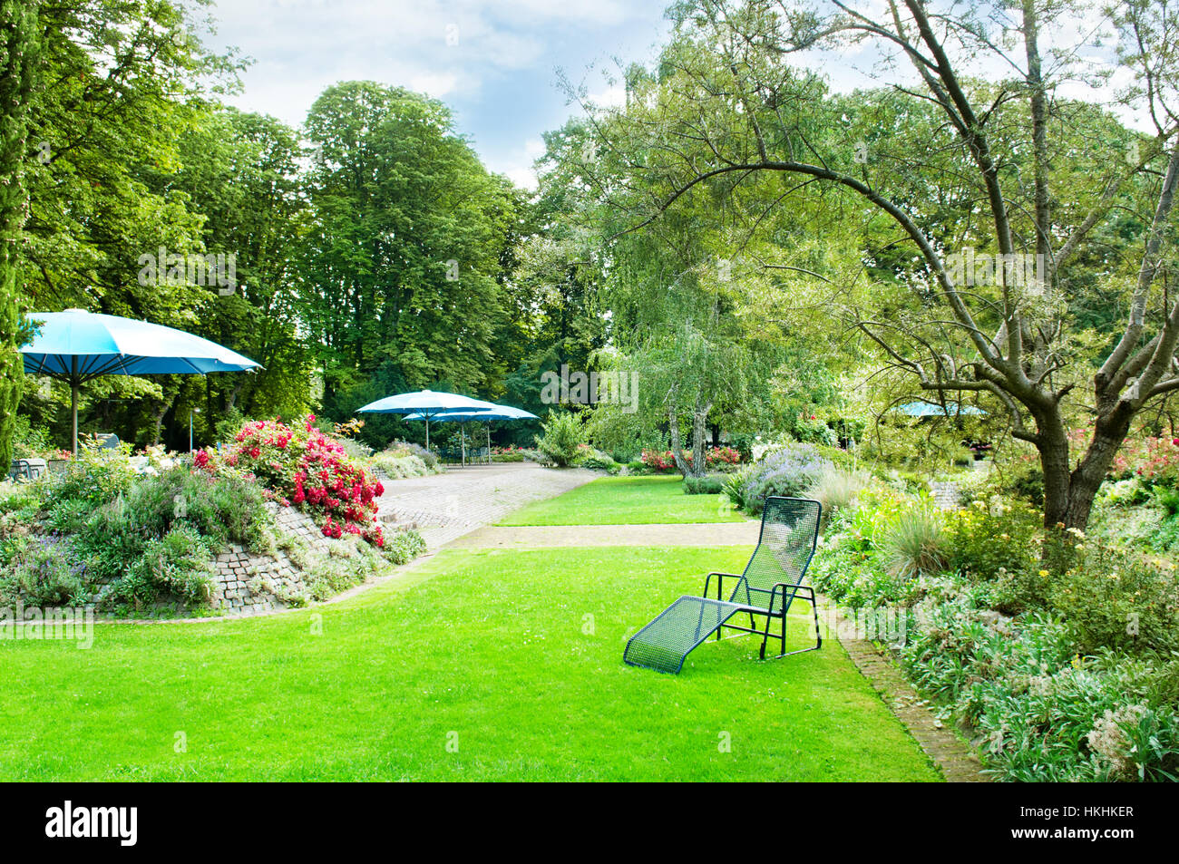 beautiful summer park with green lawns and flower beds Stock Photo - Alamy
