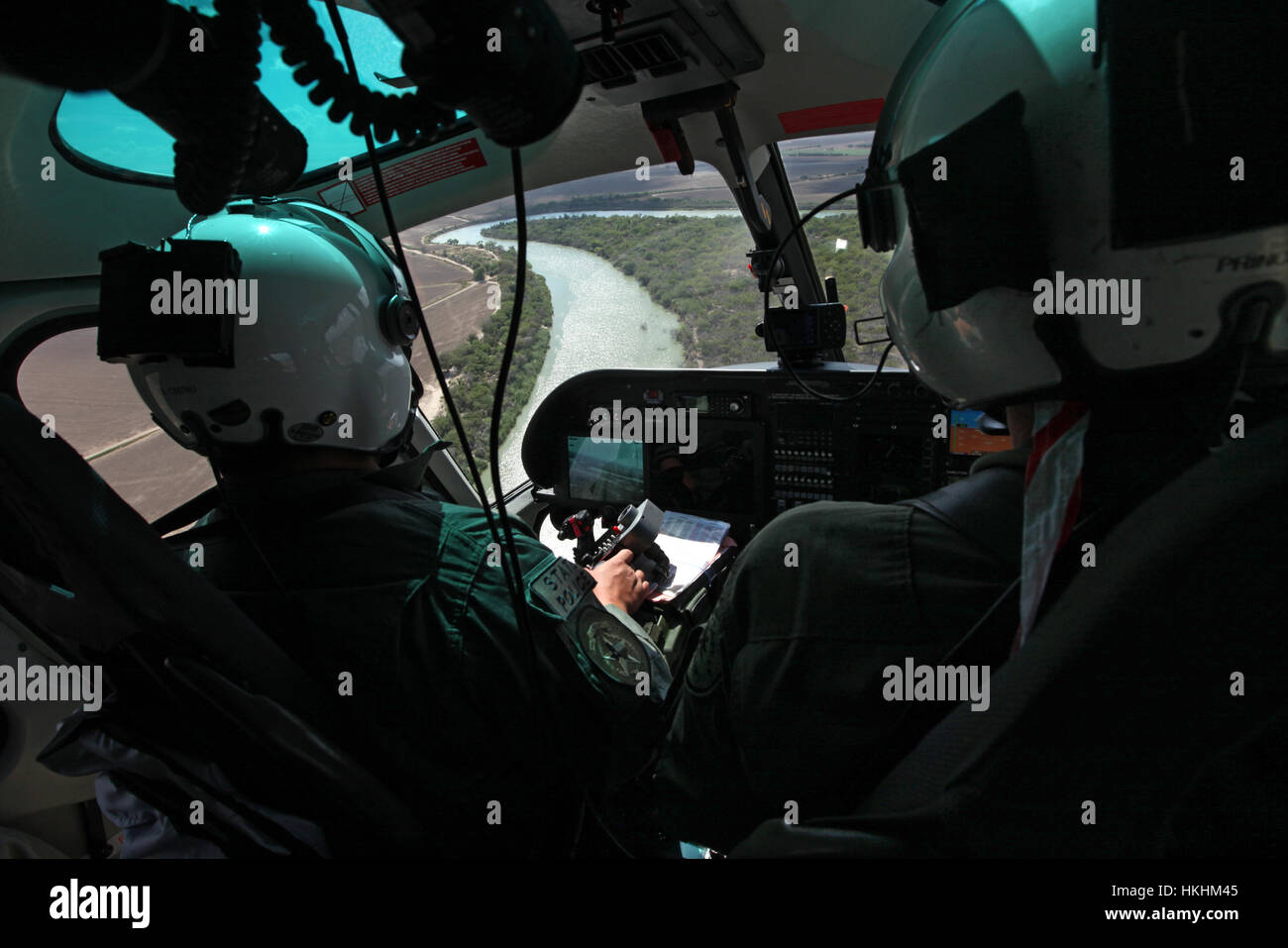 10/13/11 -  Texas Department of Public Safety pilot Lt. Johhny Prince II , right, flies over the Rio Grande River while DPS Tactical Flight Officer Mi Stock Photo