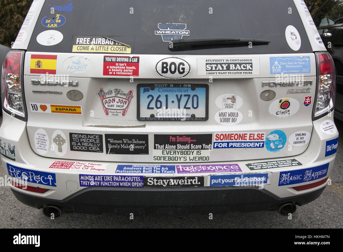 Car covered with interesting & irreverent bumper stickers Stock Photo