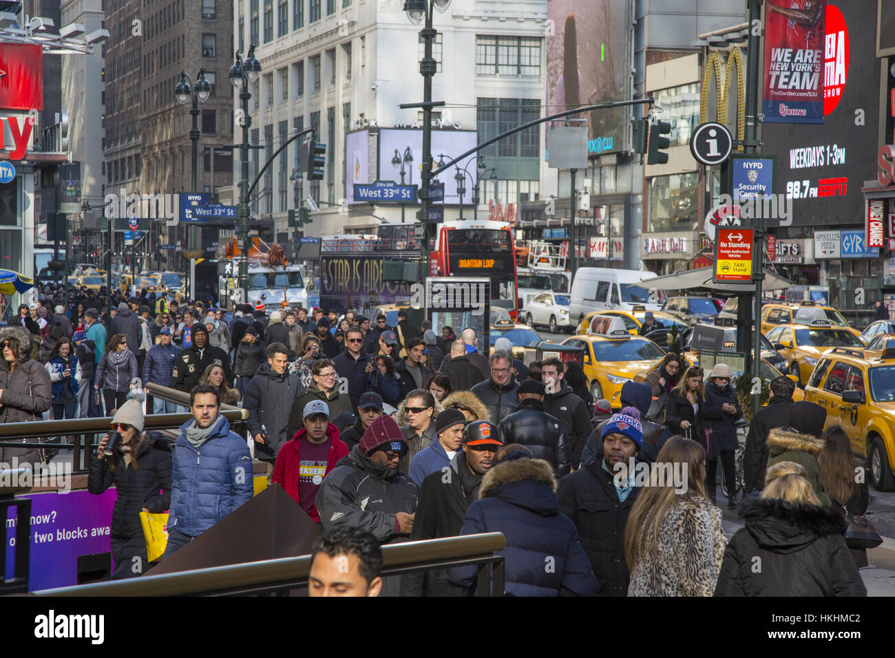 Looking north past the crowds on 7th Avenue at Penn Station and Madison Square Garden. Stock Photo
