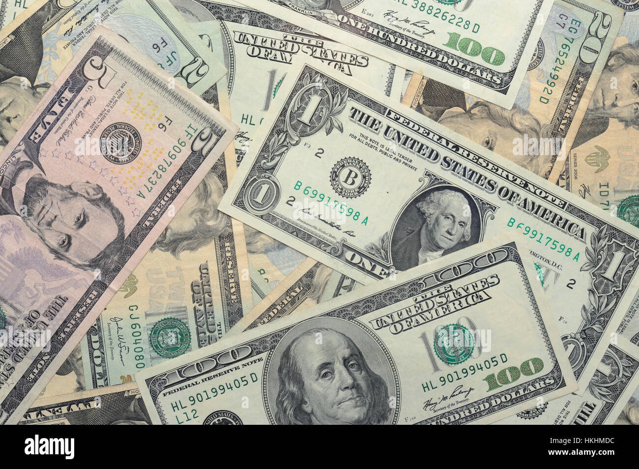 Different dollar money bills lay on table flat Stock Photo