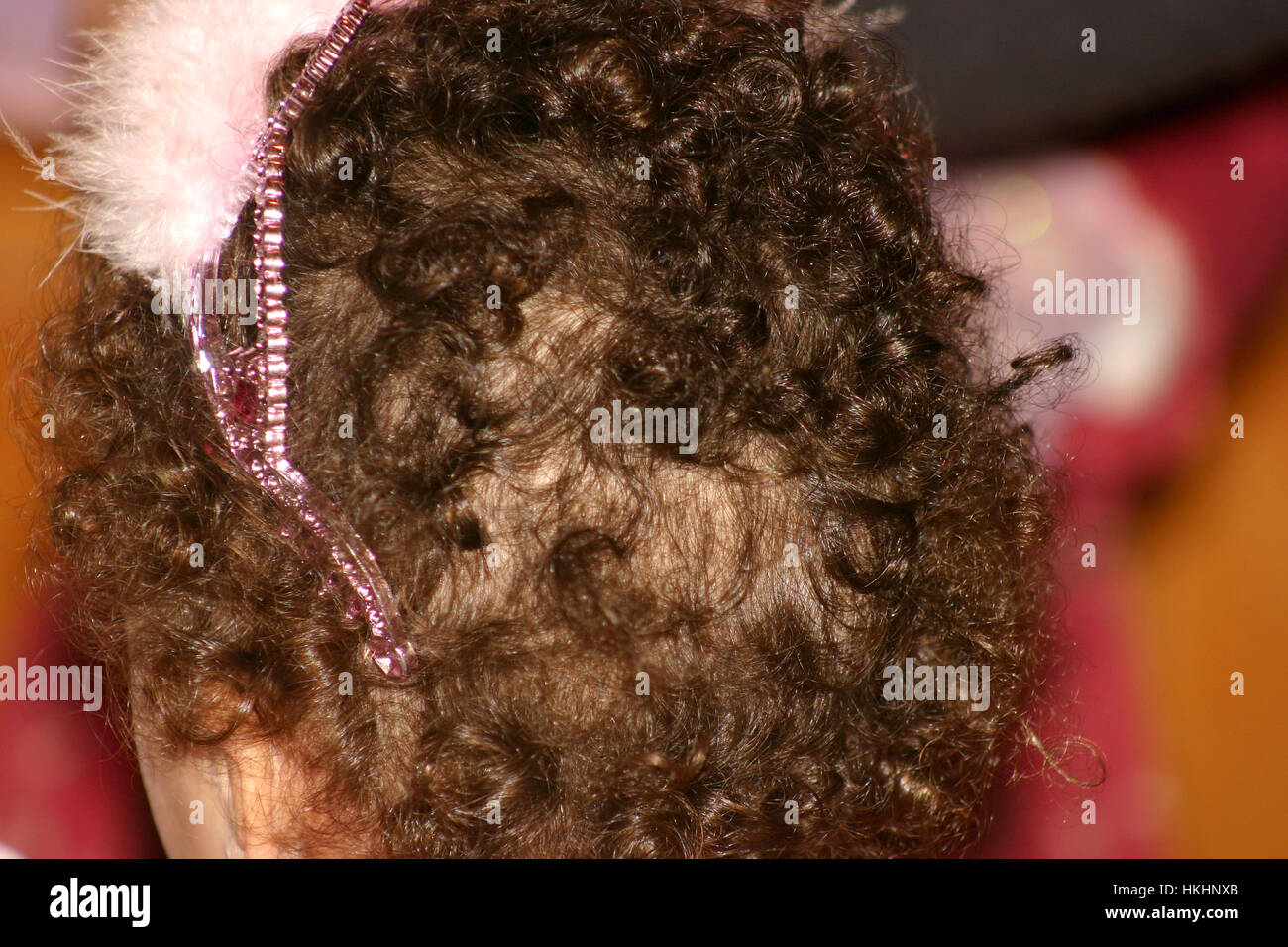 Little Caucasian Girl With Natural Curly Hair And Princess Crown