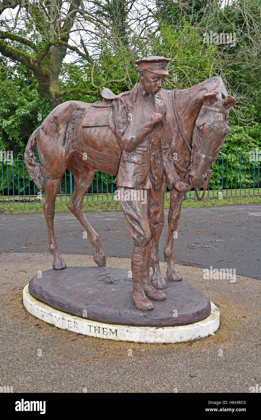War memorial statue of a soldier and warhorse by artist Amy Goodman. In the War memorial park in Romsey, Hampshire, England. Stock Photo