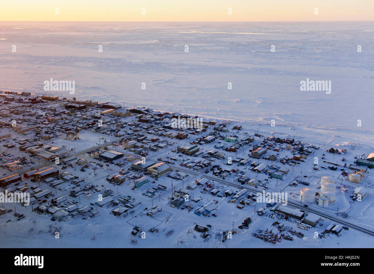 Aerial Sunrise View Of The Village Of Nome On The Seward Peninsula And Aerial Sunrise View Of The Village Of Nome On The Seward Peninsula HKJ02N