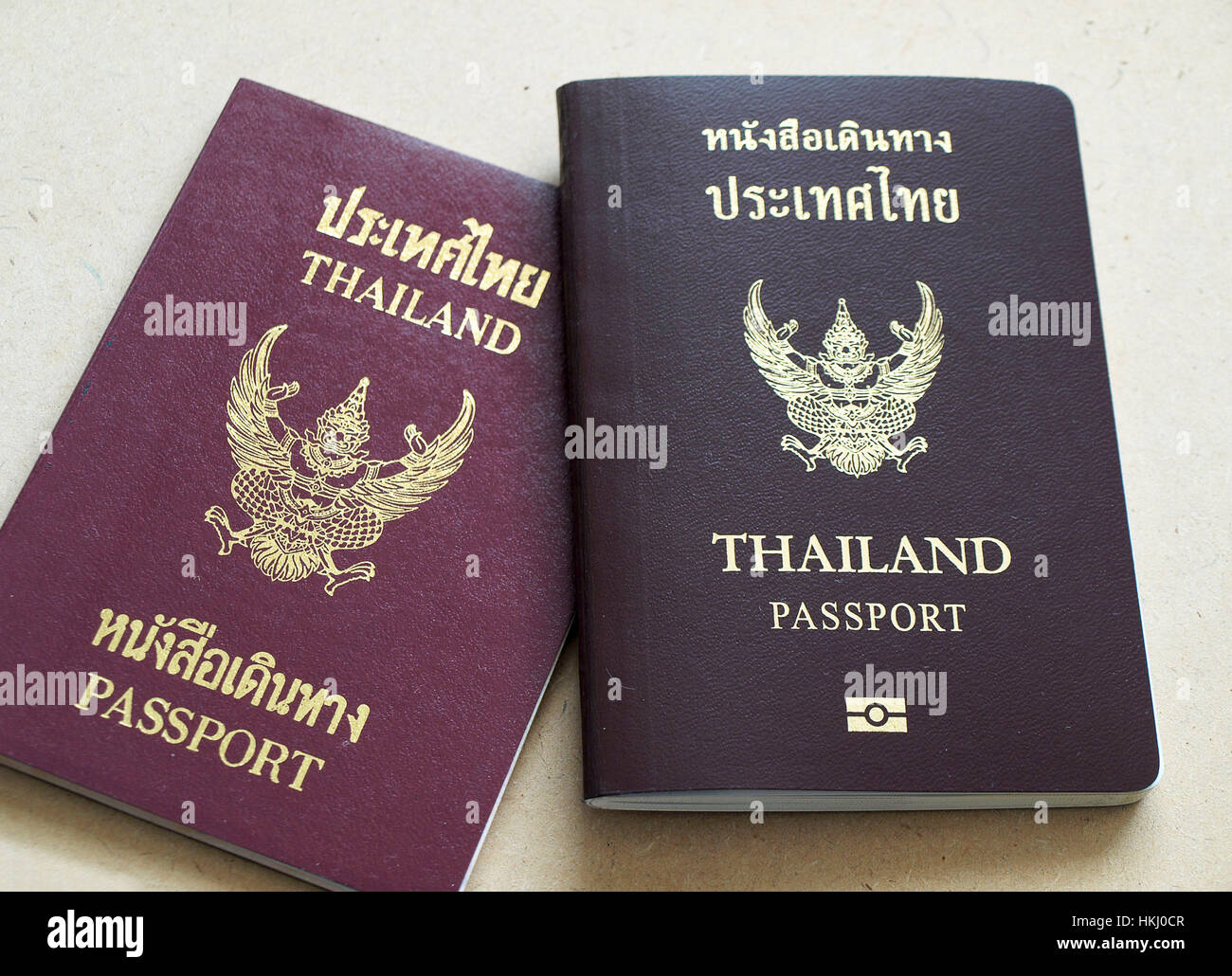 Two different Thailand passports, new passport is above old passport