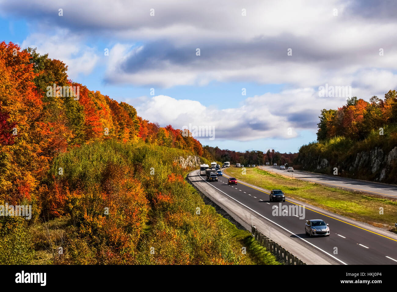 Autumn coloured forest along Autoroute 10, Eastern townships; South Stukely, Quebec, Canada