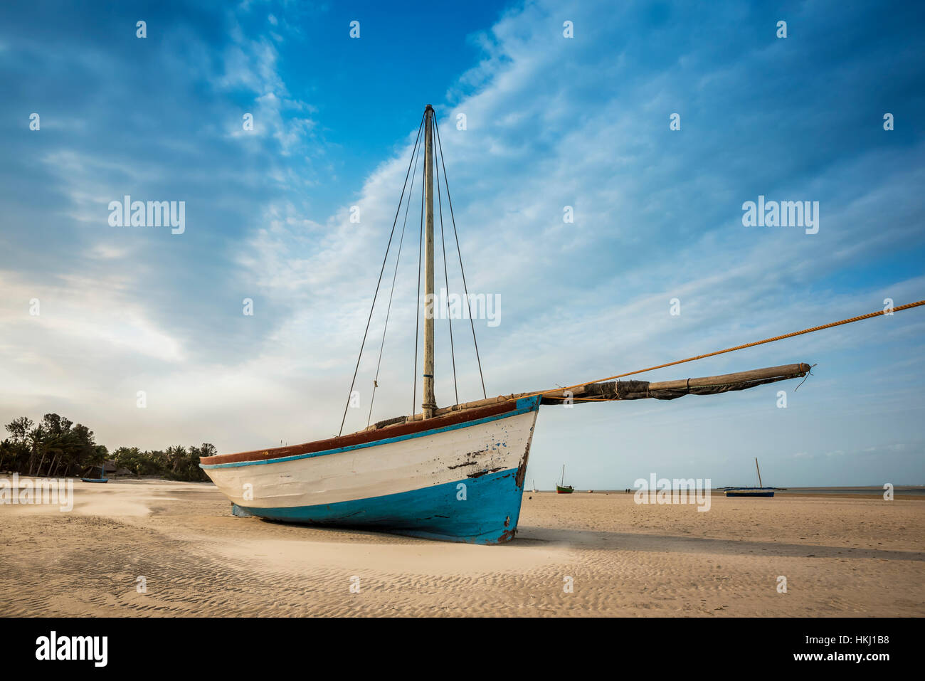 Dhow on Vilanculos beach during low tide, Bazaruto Archipelago; Mozambique Stock Photo